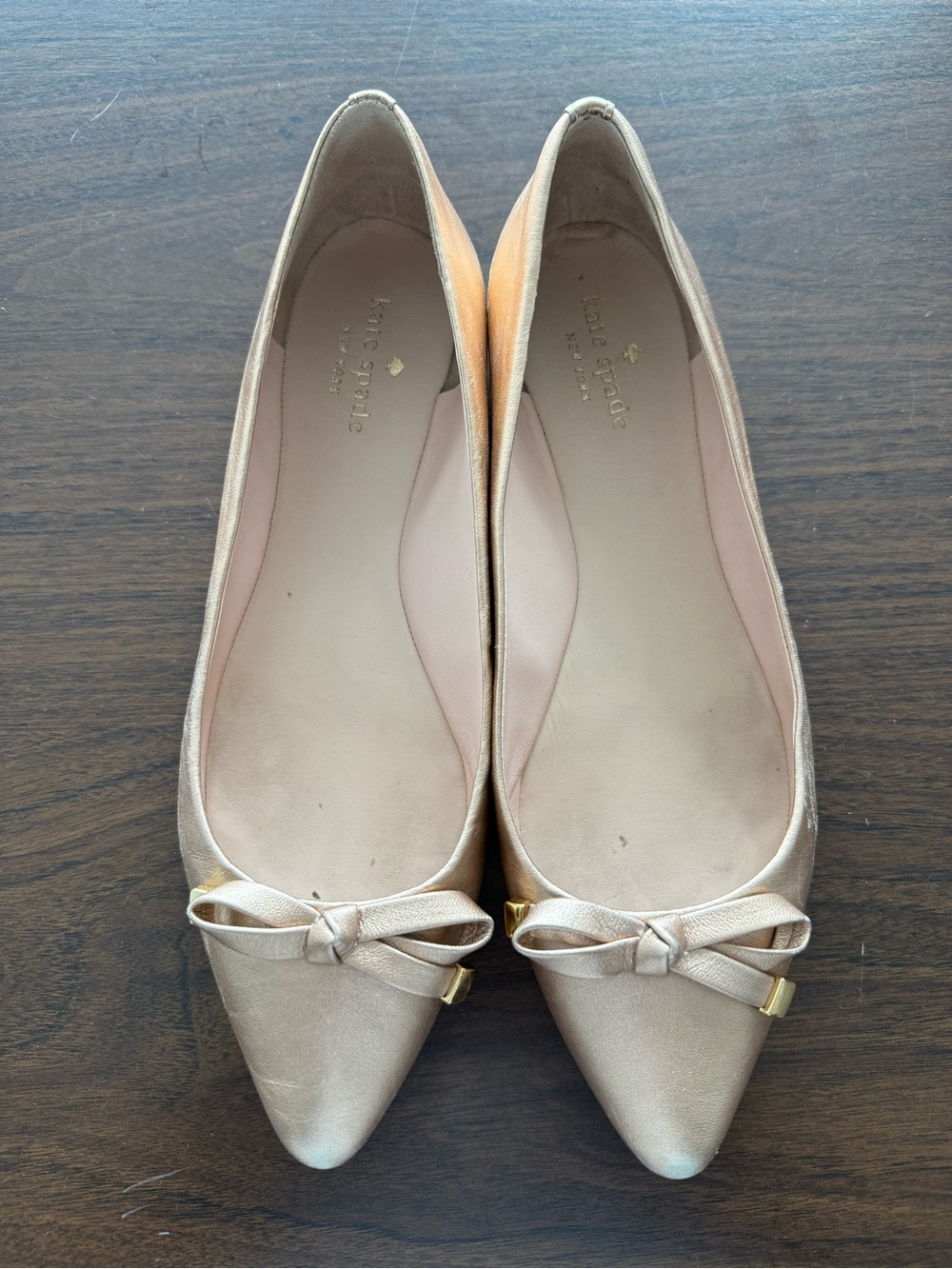 kate spade Women's Metallic Gold Pointed Toe Bow Flats